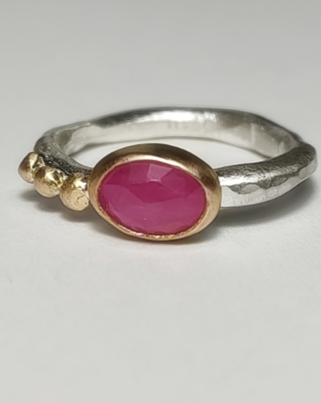 Oval Pink Sapphire Stacking Ring with Gold Pebbles